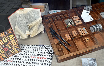Vintage wooden stamp box with rubber stamps and book art