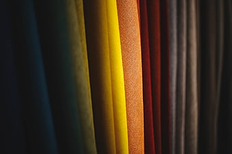 Close-up of colorful fabric rolls in a textile shop