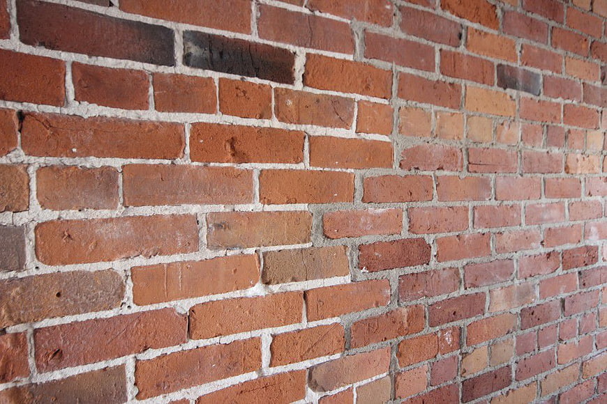 Textured Red Brick Wall Background