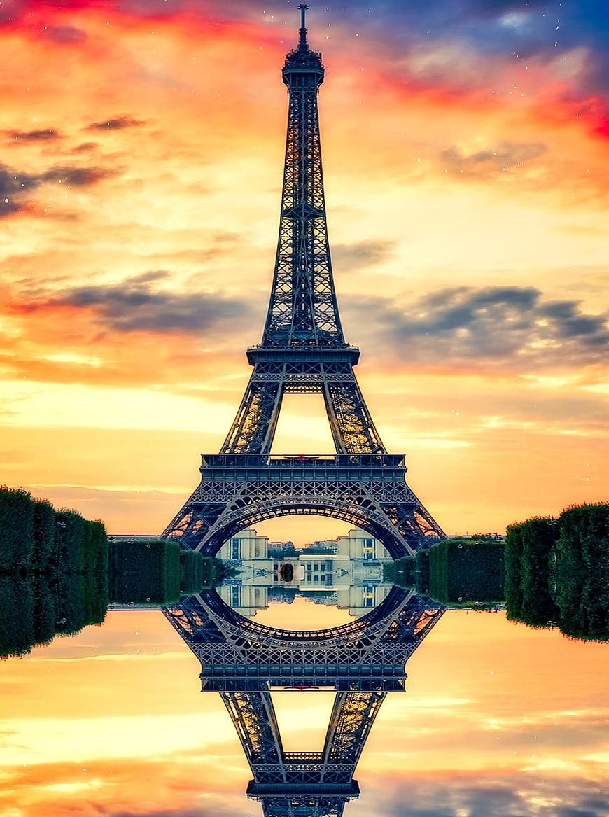 Symmetrical Eiffel Tower Reflection at Sunset