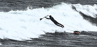 Surfer Wipeout on Ocean Wave