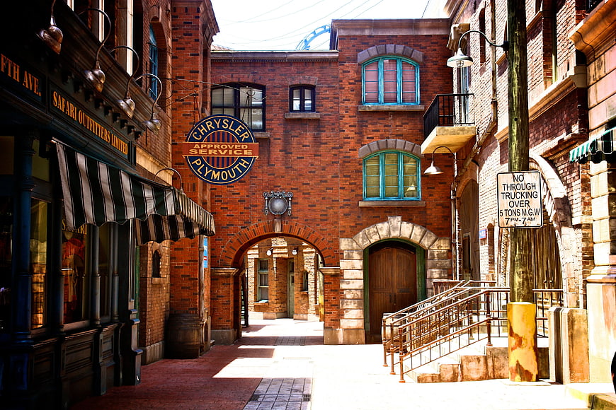 Vintage Brick Alleyway with Retro Chrysler Sign
