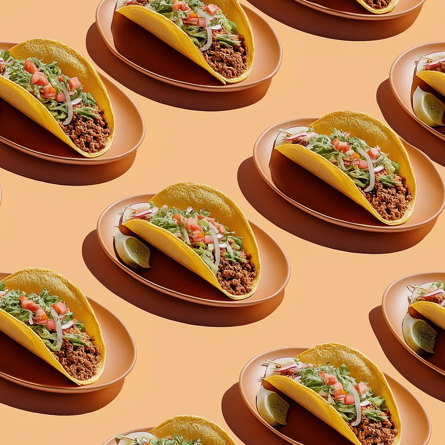 Repeating Pattern of Beef Tacos on Plates