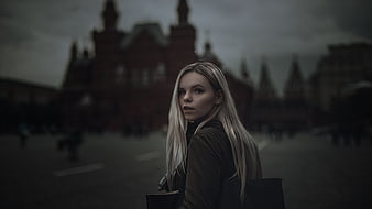 Blonde woman looking back in Moscow Red Square