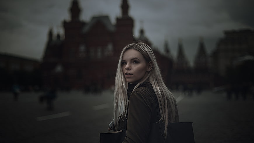 Blonde woman looking back in Moscow Red Square
