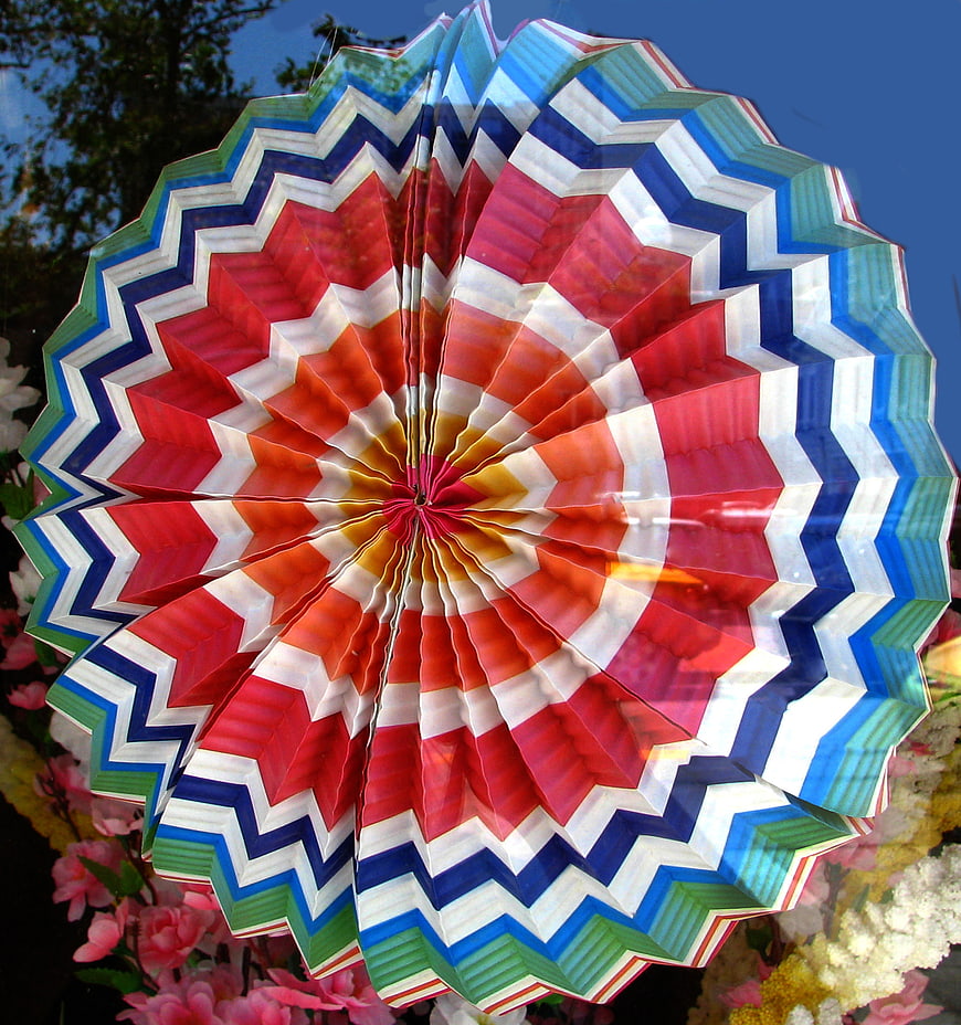 Colorful Zigzag Paper Parasol with Red, Blue, and Green Patterns