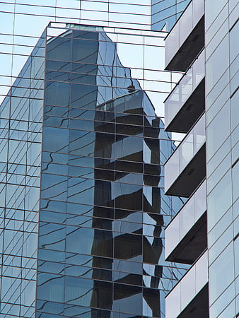 Modern Glass Building Facade with Reflections