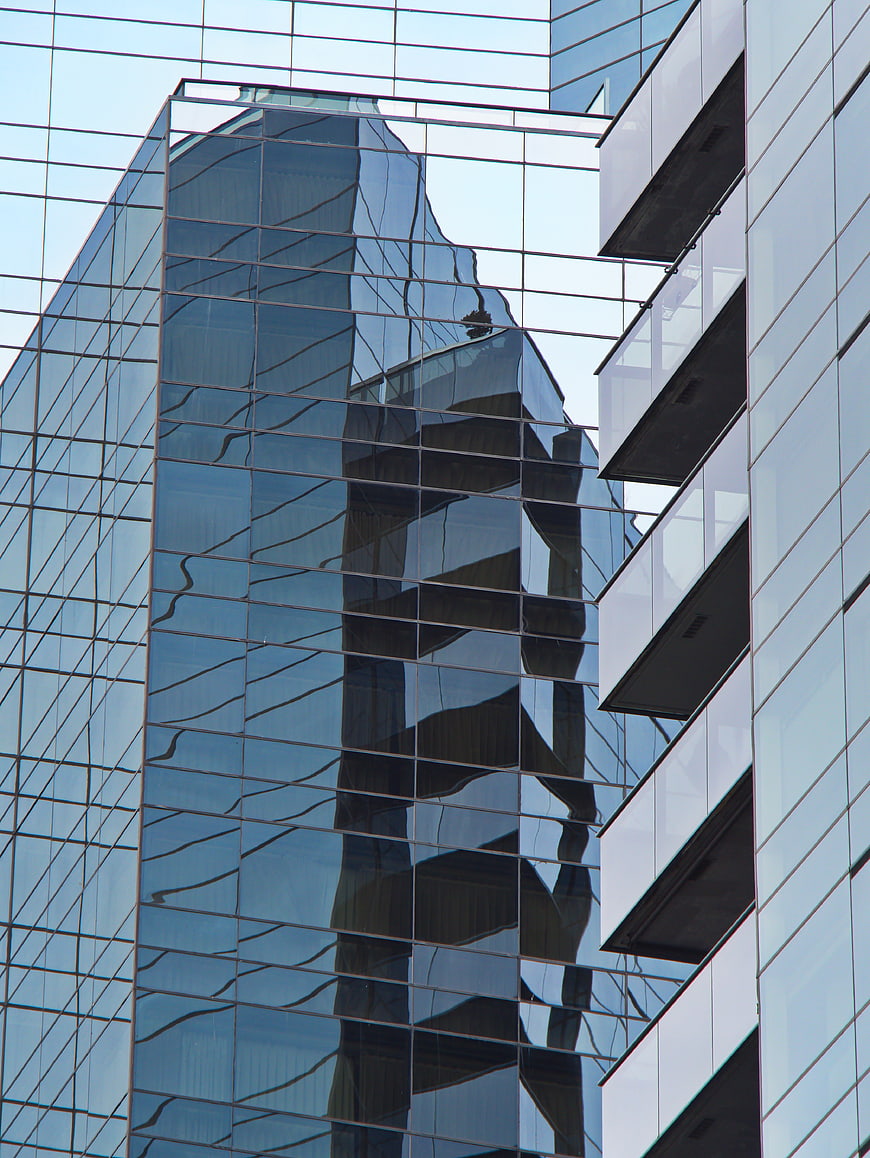 Modern Glass Building Facade with Reflections