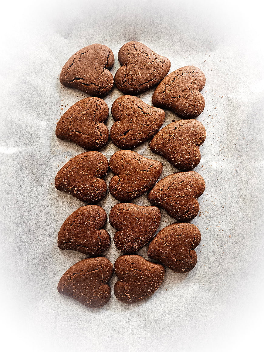 Heart-Shaped Chocolate Cookies on Parchment Paper