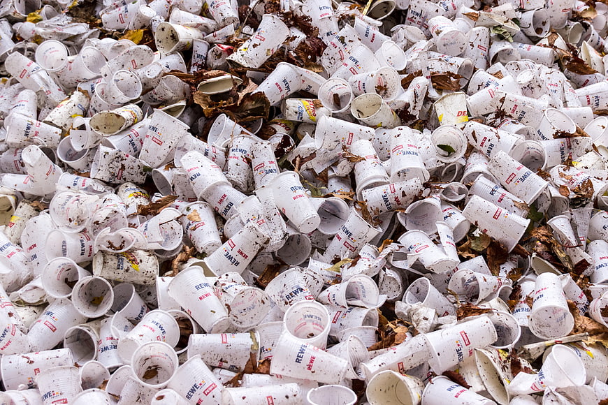 Pile of Dirty Disposable Plastic Cups and Organic Waste