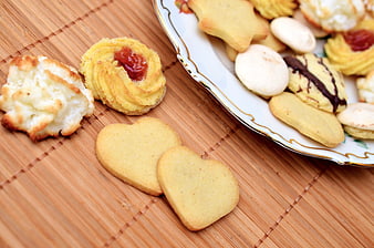 Assorted Christmas Cookies on Bamboo Mat and Plate