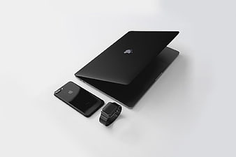 Black Apple MacBook, iPhone, and Watch on White Background