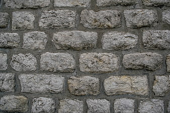 Rough gray stone wall texture background