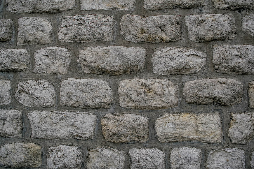 Rough gray stone wall texture background