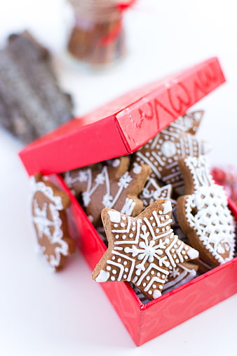 Traditional Christmas gingerbread cookies in a red gift box