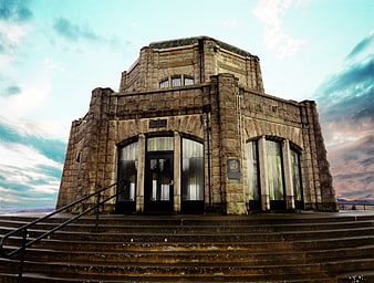 Historic Stone Monument Building With Dramatic Sky