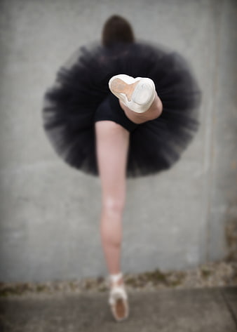 Ballerina Leg Extension with Black Tutu and Pointe Shoes