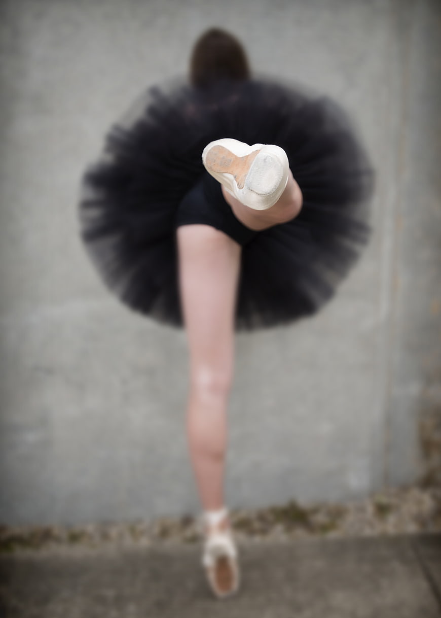 Ballerina Leg Extension with Black Tutu and Pointe Shoes