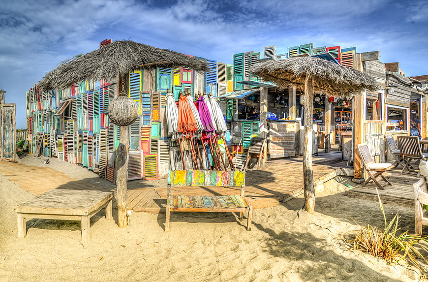 Colorful Beach Bar with Recycled Shutters and Thatched Roof