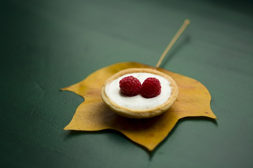 Mini Raspberry Tart on Yellow Autumn Leaf