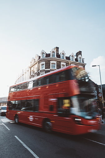 Motion Blur Red Double Decker Bus in London Street