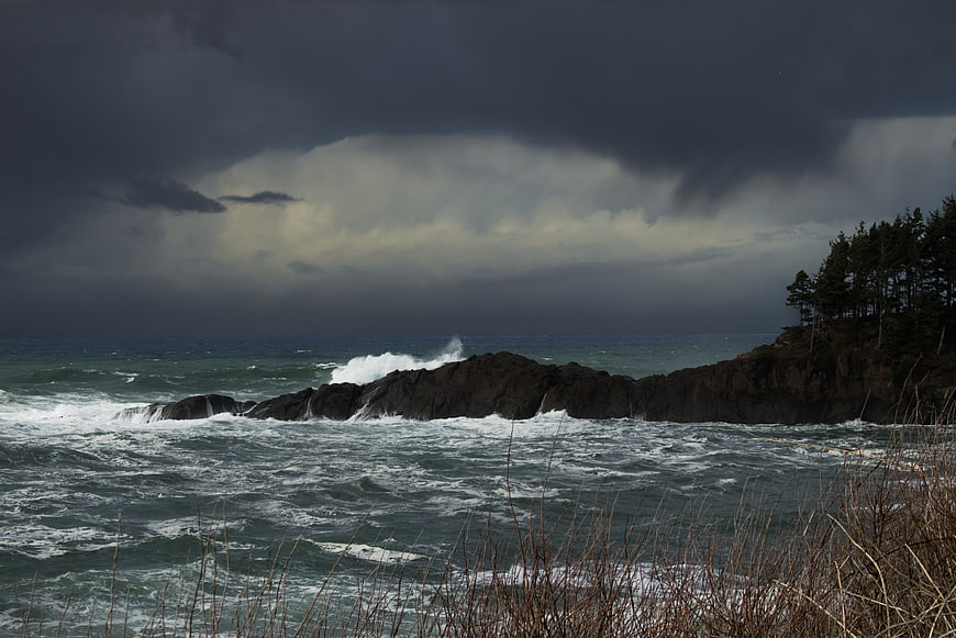 Stormy Ocean Waves Crashing Against Rocky Coastline