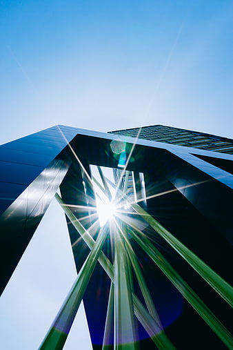 Modern Architecture with Sunburst and Lens Flare
