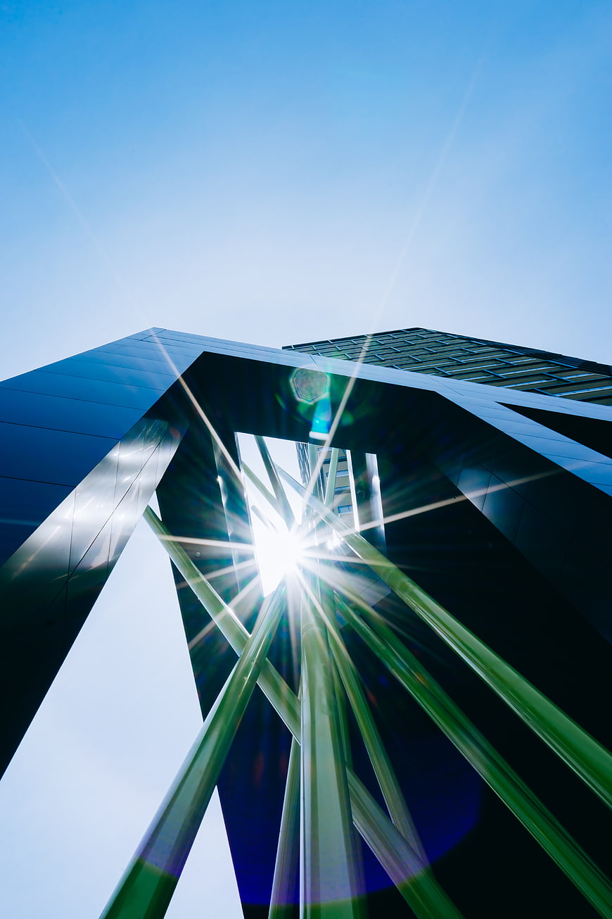 Modern Architecture with Sunburst and Lens Flare