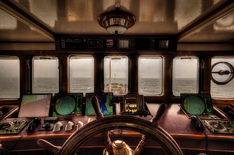 Ship's Wheel and Navigation Instruments in Pilothouse