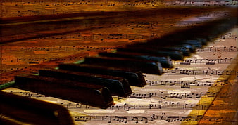 Vintage Piano Keys Over Old Sheet Music Background