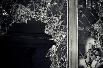 Shattered Window Glass in Abandoned Industrial Building