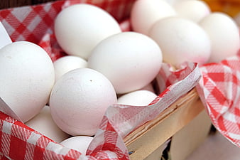 Fresh White Chicken Eggs In Wooden Basket With Red Checkered Cloth