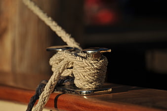 Close-up of rope on boat cleat