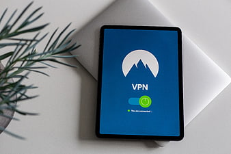 Tablet displaying VPN connection interface on white desk