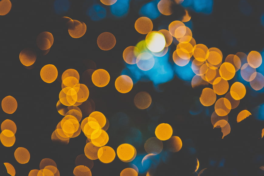 Abstract Bokeh Background with Golden and Blue Lights