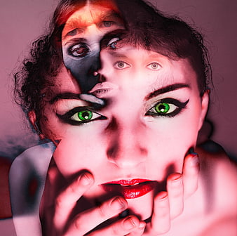 Double exposure woman face with green eyes and red lips