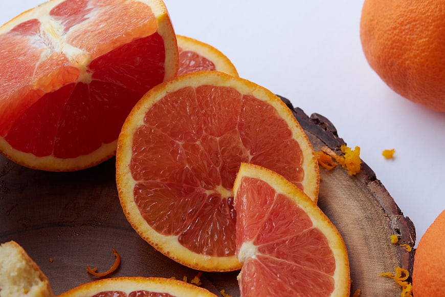 Fresh Sliced Blood Oranges on Wooden Board