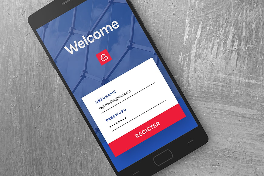 Smartphone displaying user registration login screen on concrete