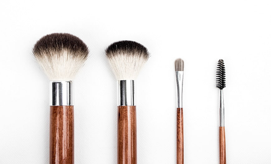 Wooden Handle Makeup Brushes on White Background