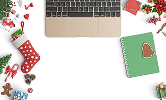Christmas Flat Lay Workspace With Laptop, Stocking, And Holiday Decorations