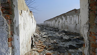 Destroyed building interior with rubble and debris