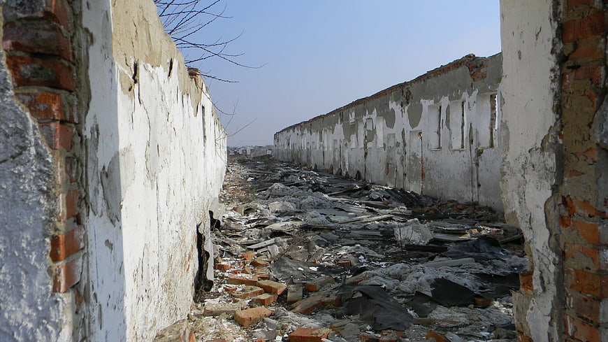 Destroyed building interior with rubble and debris