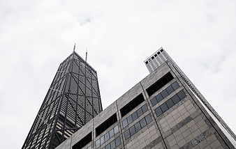 Low Angle View of Chicago Skyscrapers Against Cloudy Sky