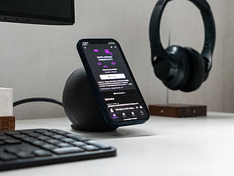 Smartphone on Desk with Podcast App and Headphones