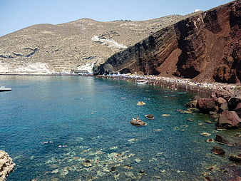 Red Beach Santorini Greece with Turquoise Water and Cliffs