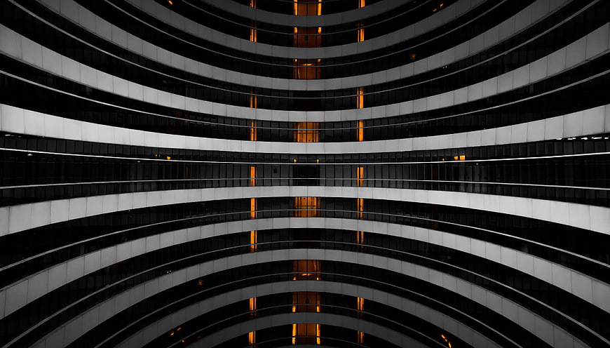 Symmetrical Curved Modern Architecture Interior with Orange Lights