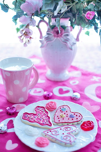 Valentine's Day Heart Cookies and Pink Mug on Table