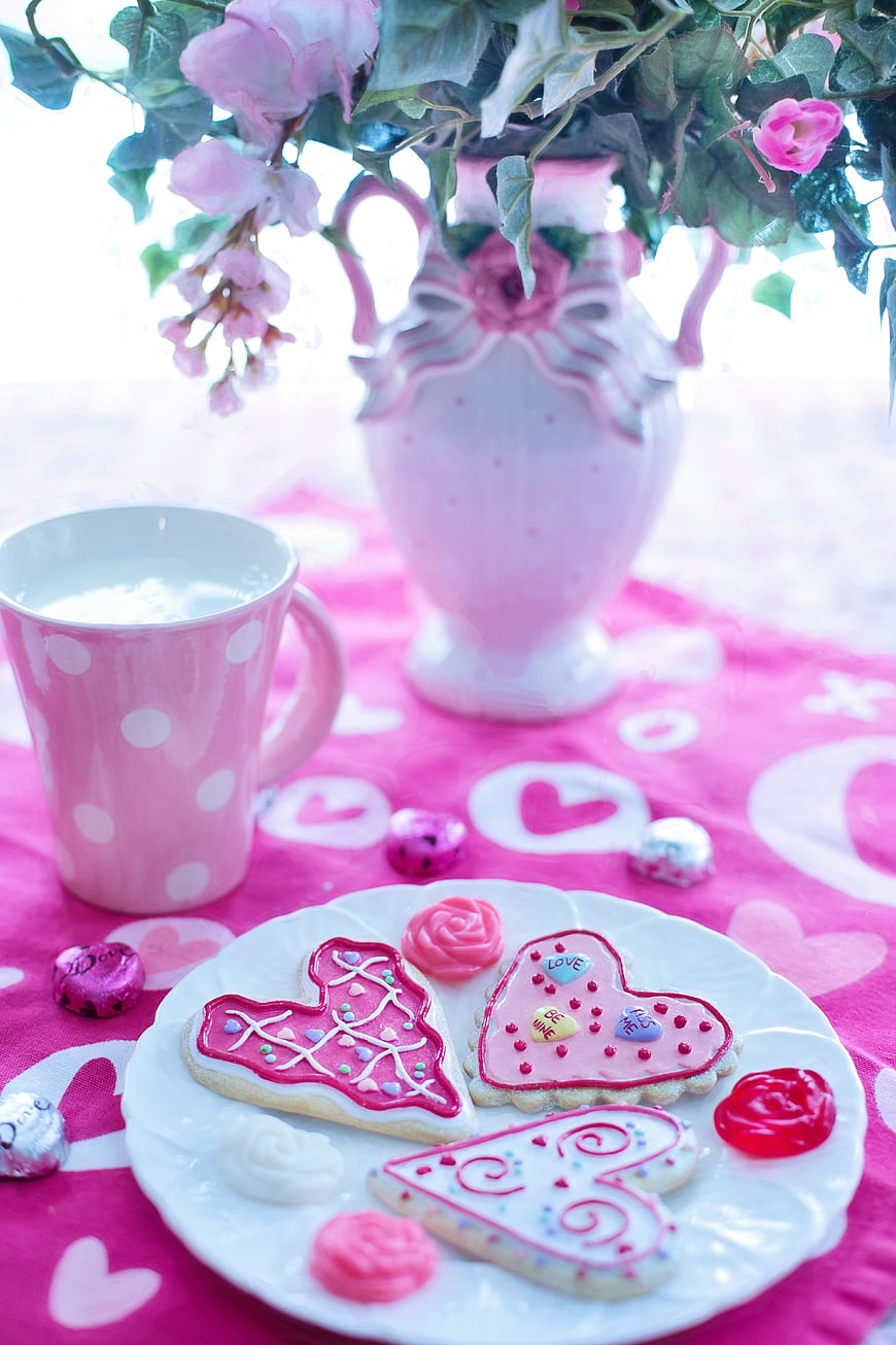 Valentine's Day Heart Cookies and Pink Mug on Table