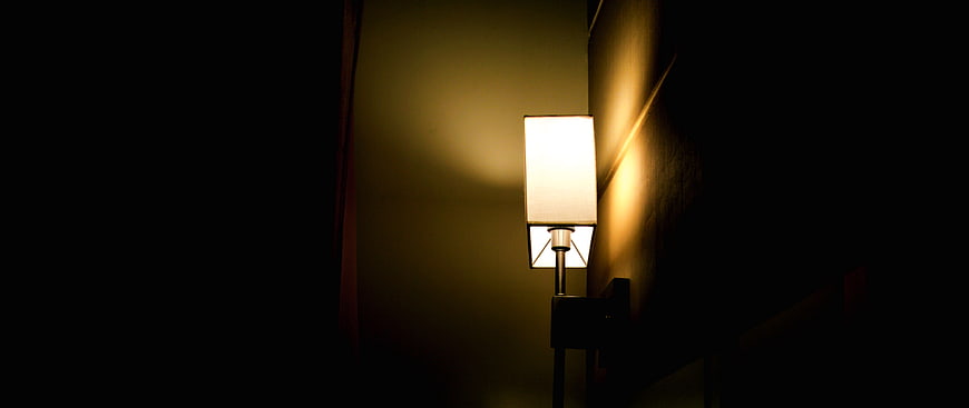 Modern Wall Sconce Lamp in Dark Interior