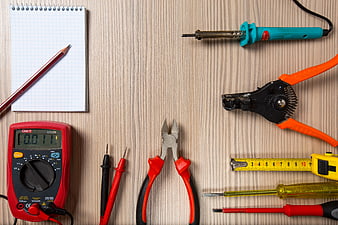 Electrical Tools Flat Lay on Wood